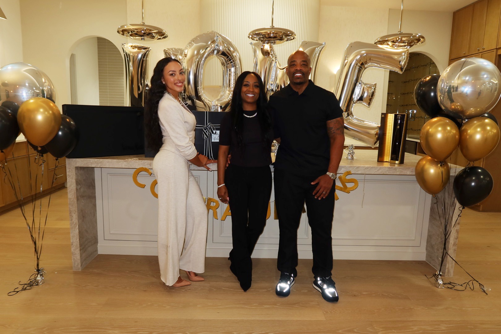 Tori with happy homeowners